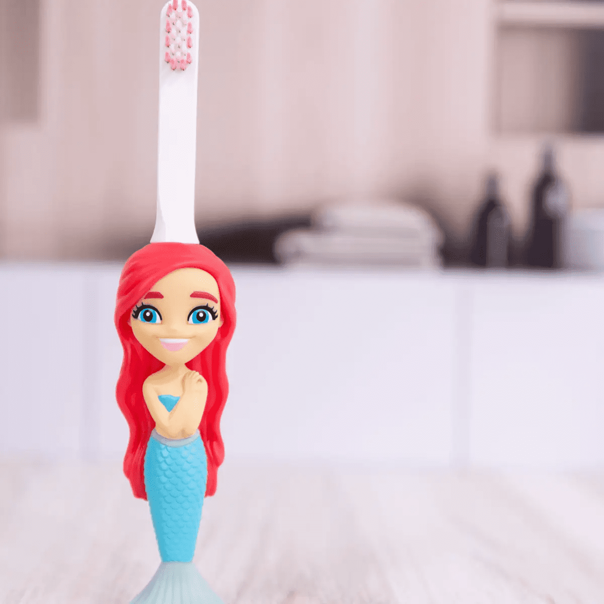 Toothbrush detailed with an Aqua the Mermaid design
