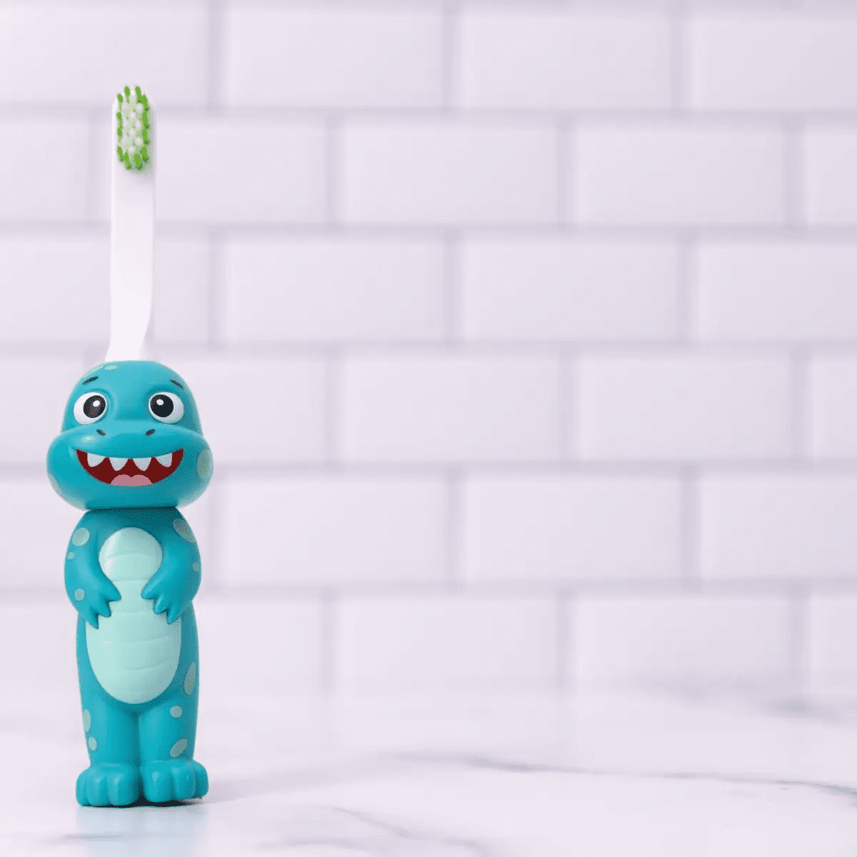 A Brushy the Brushasaurus toothbrush designed as a dinosaur toy